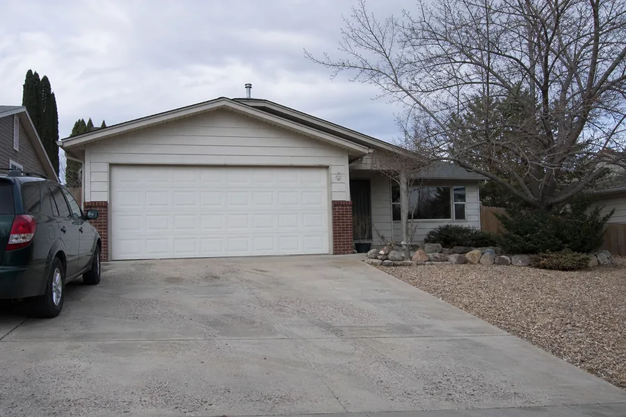 A house with an attached garage in Grand Junction, CO